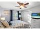 Bright bedroom with a nautical theme, window, closet, and modern dresser at 5202 Beach Se Dr # C, St Petersburg, FL 33705