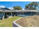 Backyard with an enclosed pool area and space for outdoor recreation at 5253 Sandra Dr, Weeki Wachee, FL 34607