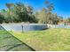 The backyard has a shed, lush greenery, and offers a serene outdoor space at 5253 Sandra Dr, Weeki Wachee, FL 34607