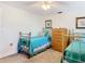 Comfortable bedroom with matching twin beds and classic decor at 5253 Sandra Dr, Weeki Wachee, FL 34607