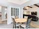 This casual dining area features a view to the living room at 5253 Sandra Dr, Weeki Wachee, FL 34607