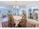Bright dining room with a view of the living spaces, ideal for Gathering gatherings at 5253 Sandra Dr, Weeki Wachee, FL 34607
