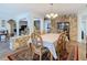 Elegant dining room with stone accents, classic furniture, and stylish lighting at 5253 Sandra Dr, Weeki Wachee, FL 34607