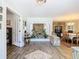 Inviting entryway features stone accents, decorative shelving, and a glimpse into the dining area at 5253 Sandra Dr, Weeki Wachee, FL 34607