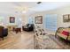 Bright living room with plentiful windows, comfortable seating, and classic decor at 5253 Sandra Dr, Weeki Wachee, FL 34607