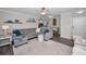 Bright living room with a comfortable gray sectional sofa and stylish decor for a cozy ambiance at 700 Lyndhurst St # 1024, Dunedin, FL 34698