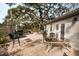 Private outdoor patio featuring brick pavers, ample seating, and lush landscaping at 700 Lyndhurst St # 1024, Dunedin, FL 34698