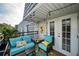 Charming patio with cozy seating, a decorative rug, and a stylish outdoor space for relaxing and entertaining at 700 Lyndhurst St # 1024, Dunedin, FL 34698