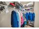 Walk-in closet featuring plenty of shelving, racks, and hanging storage at 700 Lyndhurst St # 1024, Dunedin, FL 34698