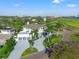 Expansive two-story home with a three-car garage, circular driveway, and an impressive aerial view at 866 S Davis Blvd, Tampa, FL 33606