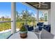 Relaxing balcony offering scenic views, comfortable seating, and glass railings at 866 S Davis Blvd, Tampa, FL 33606