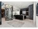 Open bar area with granite countertop, dark cabinets, and sleek design elements at 866 S Davis Blvd, Tampa, FL 33606