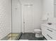 Modern bathroom featuring a glass-enclosed shower, sleek vanity, and neutral color palette at 866 S Davis Blvd, Tampa, FL 33606