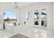 A stunning bath area with a luxurious marble tub and a private outdoor patio at 866 S Davis Blvd, Tampa, FL 33606