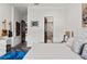 Bedroom featuring guitars, herringbone floors, and art at 866 S Davis Blvd, Tampa, FL 33606