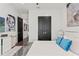 Stylish bedroom featuring a modern bed, sleek furniture, and contemporary artwork at 866 S Davis Blvd, Tampa, FL 33606