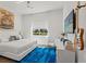 Bright bedroom featuring a guitar accent, view, and stylish rug at 866 S Davis Blvd, Tampa, FL 33606