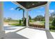 Serene front porch offering shade, grand columns, and scenic neighborhood views at 866 S Davis Blvd, Tampa, FL 33606