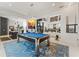 Spacious game room with a pool table, open layout, and modern design elements at 866 S Davis Blvd, Tampa, FL 33606