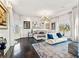 Spacious main bedroom with dark wood floors, modern furnishings, and bright, natural light at 866 S Davis Blvd, Tampa, FL 33606