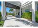 Impressive home with a shaded portico, grand columns, and well-maintained landscaping at 866 S Davis Blvd, Tampa, FL 33606