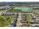 An aerial shot of a neighborhood with mature landscaping near lakes and community amenities at 9116 Grant Line Ln, Riverview, FL 33578