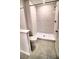 Modern bathroom featuring a glass enclosed shower, white subway tile, and stylish fixtures for a spa-like experience at 11115 Wishing Cloud Rd, Land O Lakes, FL 34638