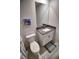 Bathroom featuring stylish vanity with granite countertop, complemented by charming decor at 11115 Wishing Cloud Rd, Land O Lakes, FL 34638