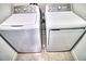 A pair of matching GE washer and dryer set in a laundry area at 11115 Wishing Cloud Rd, Land O Lakes, FL 34638