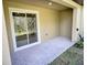 A cozy outdoor patio provides a private space for relaxation and enjoying the natural surroundings at 11115 Wishing Cloud Rd, Land O Lakes, FL 34638