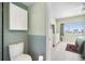 En suite bathroom featuring modern fixtures and easy access to the bedroom at 1200 N Shore Ne Dr # 110, St Petersburg, FL 33701