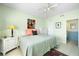 Serene bedroom with calming colors, decorative touches, and natural light at 1200 N Shore Ne Dr # 110, St Petersburg, FL 33701