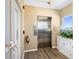 Hallway featuring an elevator and wood-style floors at 1200 N Shore Ne Dr # 110, St Petersburg, FL 33701