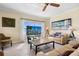 Bright living room with water views and comfortable seating at 1200 N Shore Ne Dr # 110, St Petersburg, FL 33701