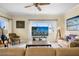 Living room with an entertainment center featuring a nice water view at 1200 N Shore Ne Dr # 110, St Petersburg, FL 33701