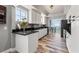 Stylish kitchen with stainless steel appliances, granite countertops, and ample cabinet space at 12033 Gandy N Blvd # 175, St Petersburg, FL 33702