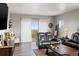 Cozy living room with sliding glass doors to a balcony providing lots of natural light and picturesque views at 12033 Gandy N Blvd # 175, St Petersburg, FL 33702