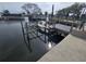 Exterior image of the boat lift system on the canal at 12734 2Nd Isle, Hudson, FL 34667