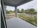 Outdoor space with concrete patio and pond views at 14300 Kay Ln, Port Charlotte, FL 33981