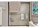 Bathroom featuring a stained glass window detail in the shower at 1508 Cascade Ct, Dunedin, FL 34698
