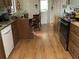 Functional kitchen featuring wood cabinets and modern appliances at 16921 Crawley Rd, Odessa, FL 33556