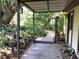 Scenic walkway with lush tropical foliage and a serene, private setting at 16921 Crawley Rd, Odessa, FL 33556