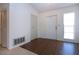 Bright foyer featuring tile flooring, double closet, and natural light from window at 1742 W Del Webb Blvd, Sun City Center, FL 33573