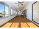 Bright sunroom with carpet and ceiling fans at 1742 W Del Webb Blvd, Sun City Center, FL 33573