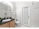 Bathroom featuring a sink, vanity, and a shower at 2015 Golf Manor Blvd, Valrico, FL 33596