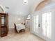 Formal dining room featuring tile floors, a chandelier, and natural light at 2015 Golf Manor Blvd, Valrico, FL 33596