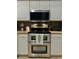 Stainless steel double oven and microwave provide cooking convenience at 2015 Golf Manor Blvd, Valrico, FL 33596