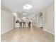Open-concept living room with tile floors and a ceiling fan at 2015 Golf Manor Blvd, Valrico, FL 33596