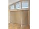 Living room featuring tile flooring and large window with horizontal blinds at 2015 Golf Manor Blvd, Valrico, FL 33596