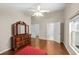 Spacious main bedroom featuring wood floors and ensuite bathroom at 2015 Golf Manor Blvd, Valrico, FL 33596